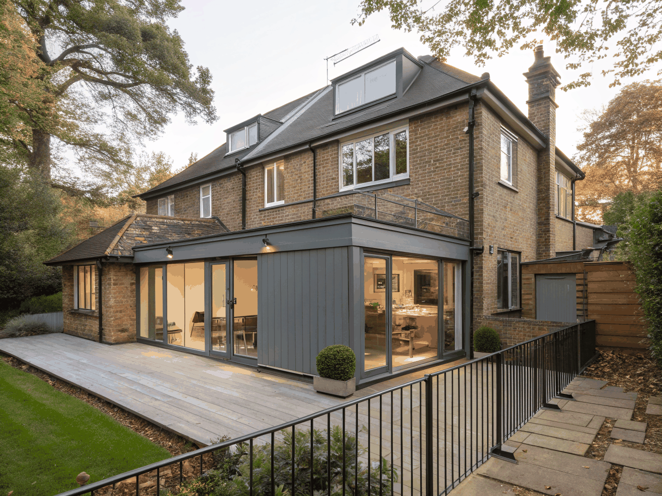 Rear single-storey home extension with floor-to-ceiling aluminium bi-fold doors and skylights